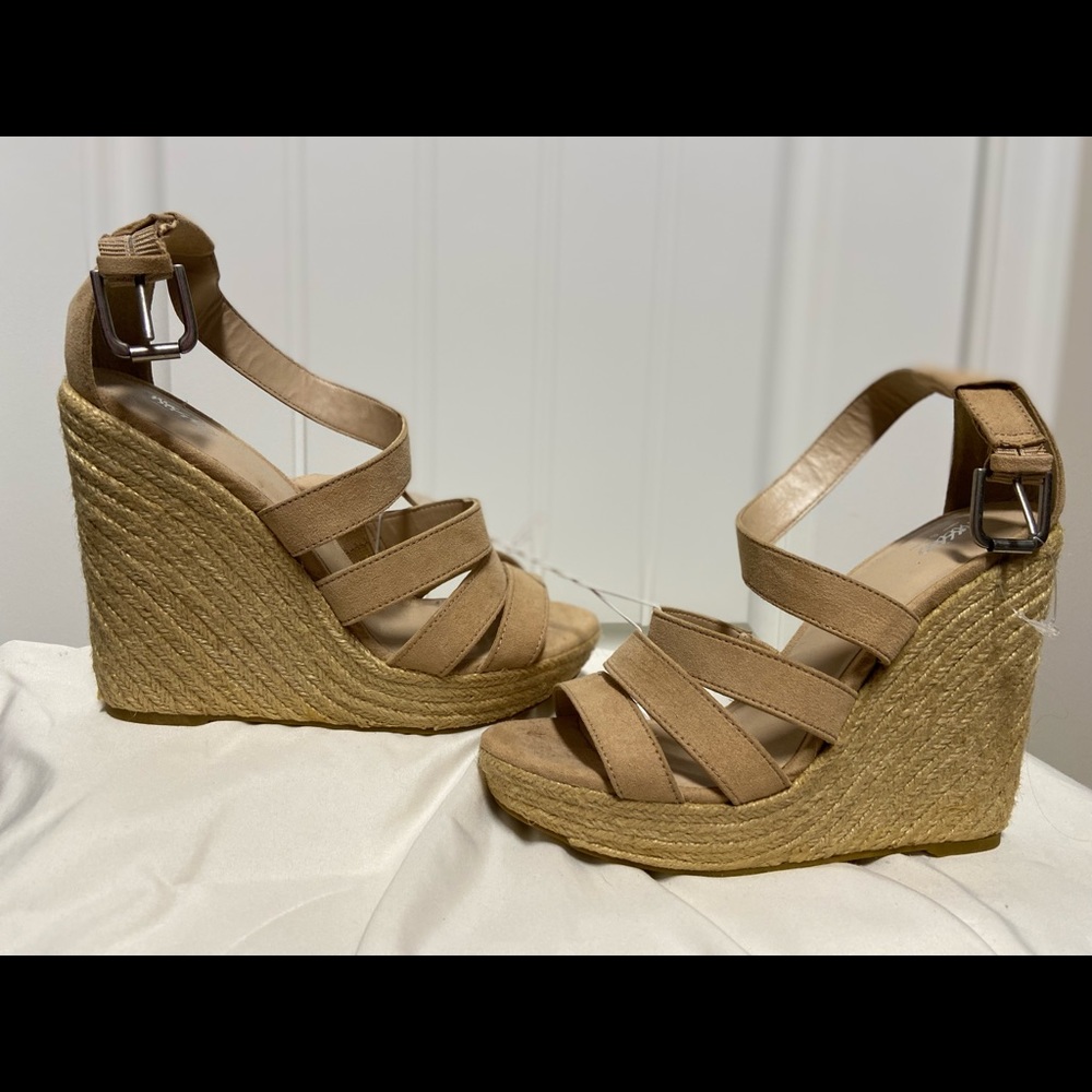 New espadrilles never worn.